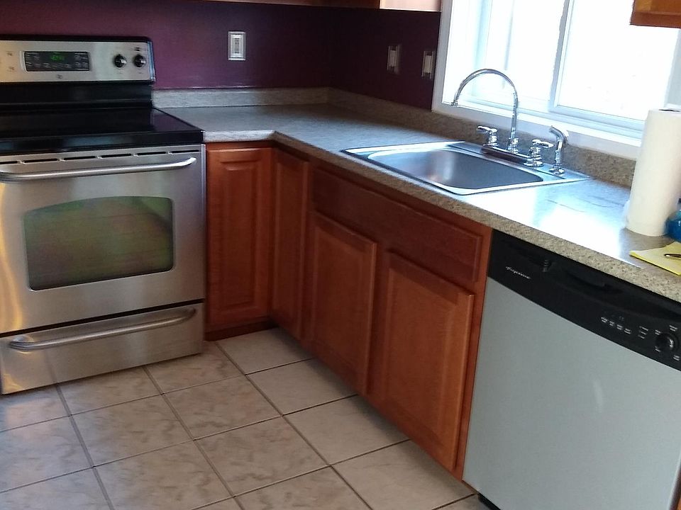 Kitchen with tiled flooring