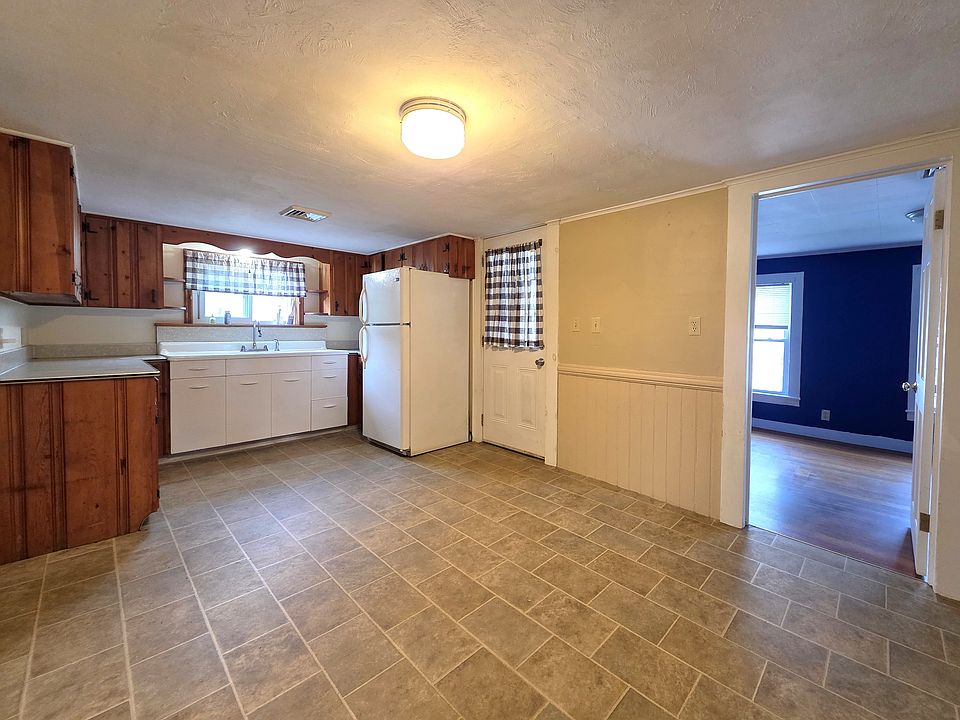 Kitchen View 2 - Door to private back balcony & Steps