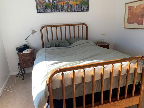 Bedroom 2 with queen bed and full bath