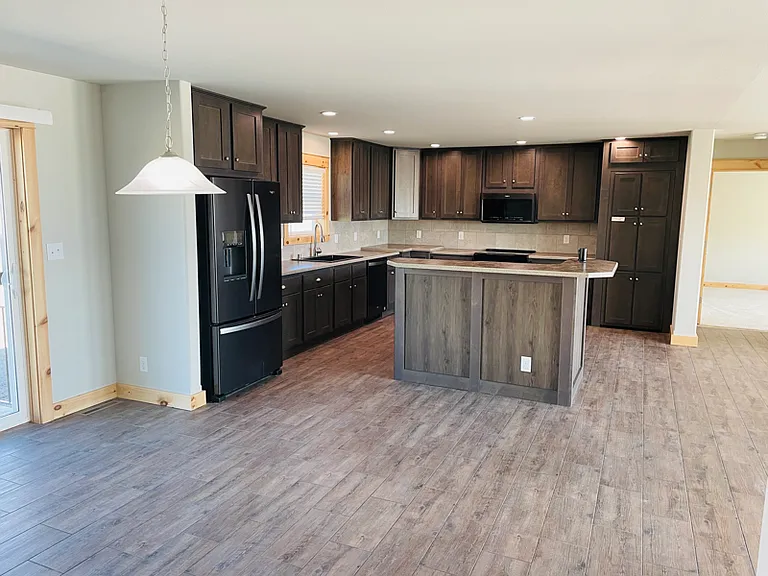 Spacious kitchen built for entertaining with spacious dining area