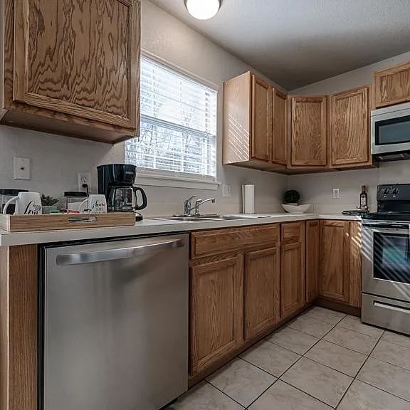 These are not actual photos of the unit. The actual unit it is currently being renovated but the space is identical.