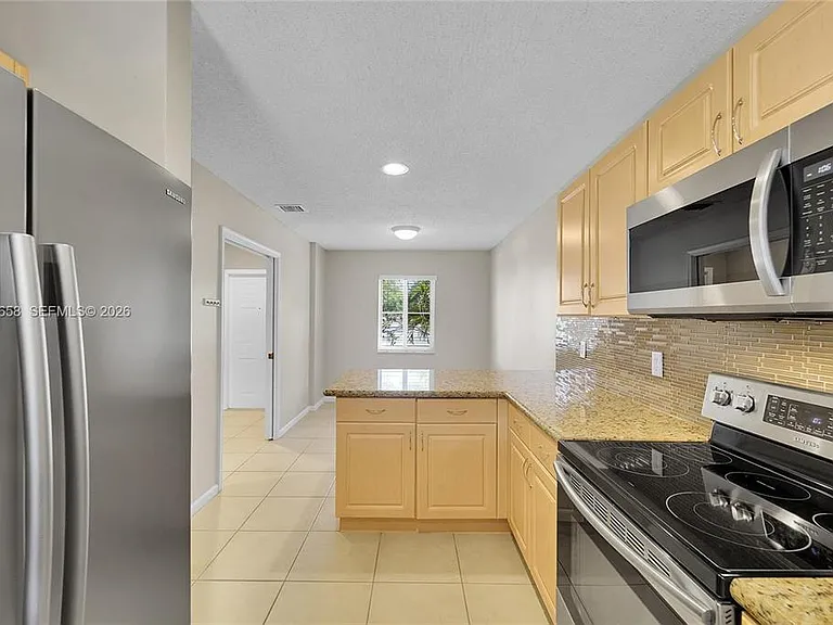 9840 NW 19th Pl — Photo 4