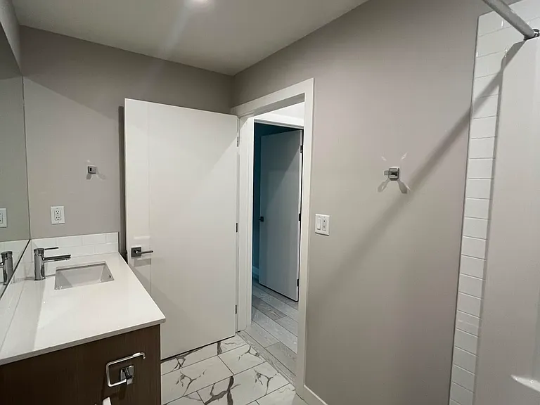 265 Wolf Willow Blvd SE #308 — Photo 16