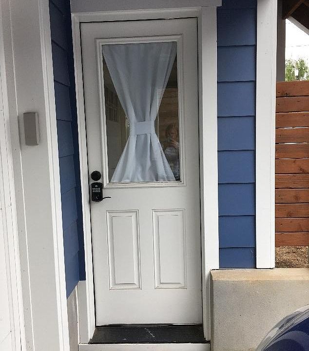 entry in driveway with keypad lock