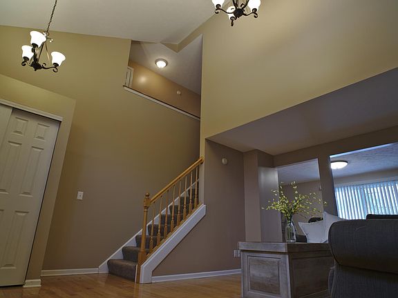 Front door to the left. Large coat closet as you walk in. Heading upstairs will lead you to the bedrooms/office. Living room, dining room and kitchen all on main floor.