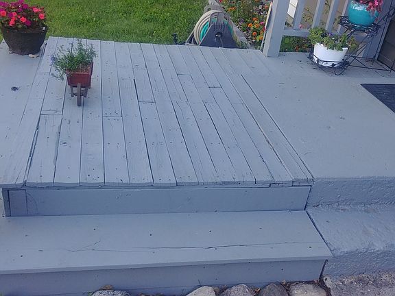 Front deck has sidewalk 