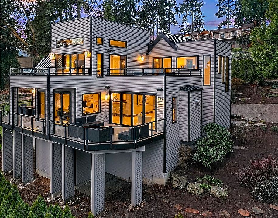 Exquisite and flawless contemporary home with over $500k in renovations. New roof, decks, windows, floors, doors & more!