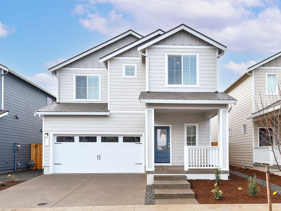 The Larch is a beautiful two story home with siding.