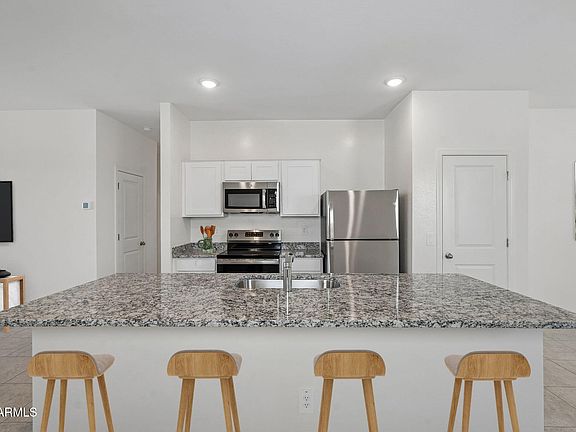 5th image of 5842 E HORNBLENDE Way