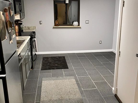 Plenty of room for a kitchen table and 4 to 6 chairs.