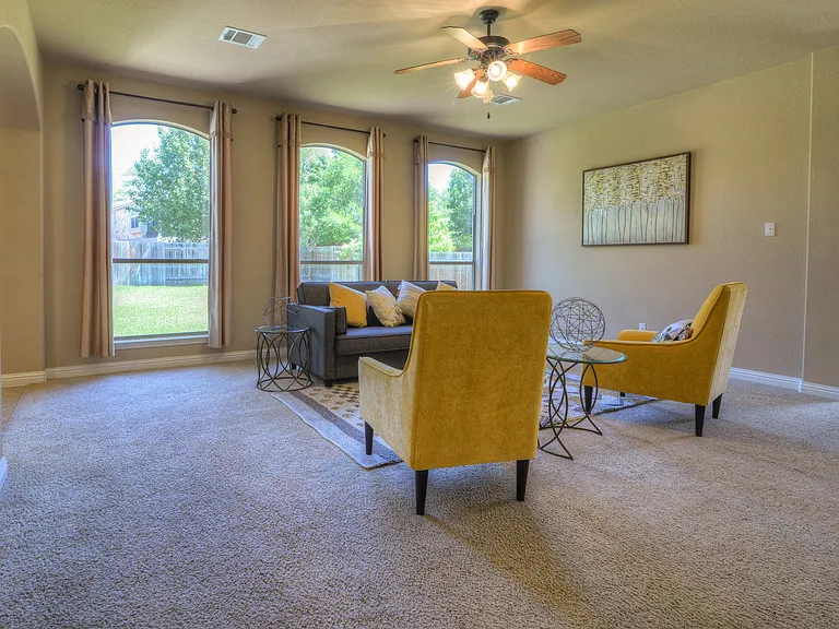 Living room is going to have brand new wide light colored LVP. Photo from previous staging