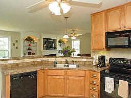 Even the kitchen has a ceiling fan, all appliances stay