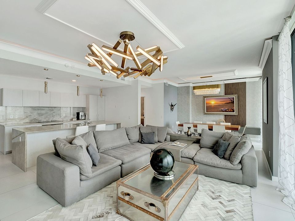 Living Room / Enjoy Unobstructed water views and access to the Balcony from every room.