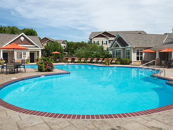 Resort-style hilltop pool with sundeck