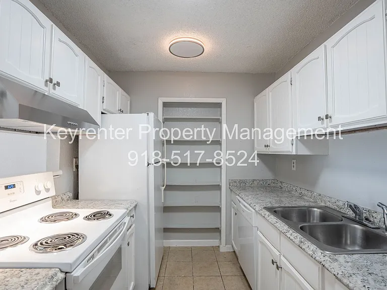 1448 S 108th East Pl — Photo 7