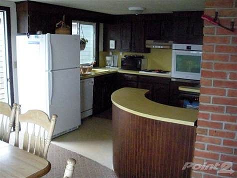 Kitchen with sliders to deck