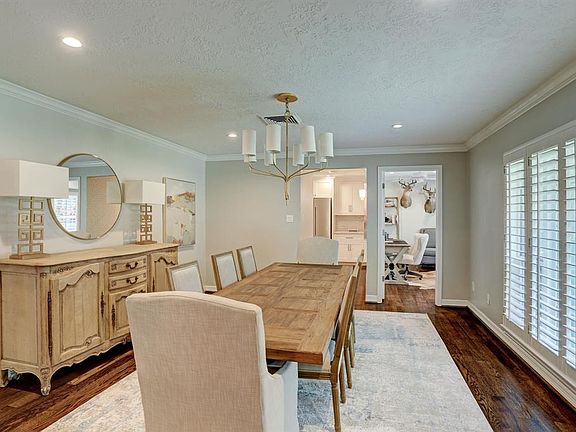 There is access to the kitchen from the dining room. Also the home office is off the dining room as well.