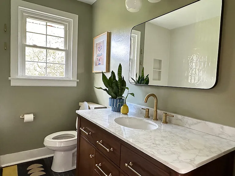 Full bathroom with soaking tub.