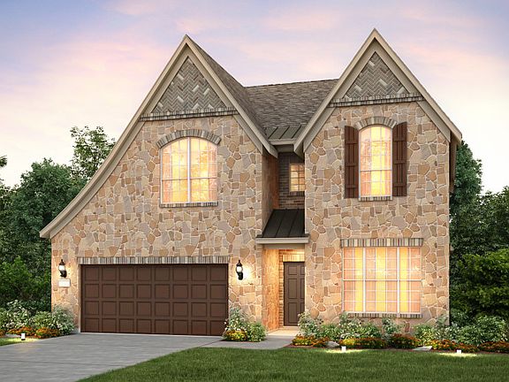 The Lexington, a two-story home with 2-car cedar garage, shown as Home Exterior F