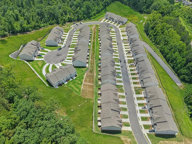 Aerial view of the Satterfield Commons neighborhood featuring homes and a crosswalk.