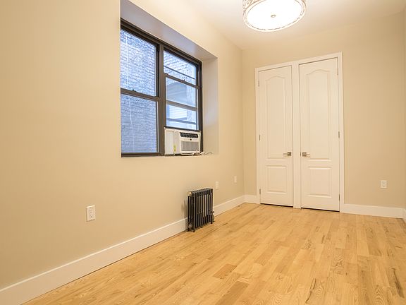 5th image of 212 E 13th St APT 2D