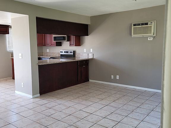 Kitchen eating area including partial living room.