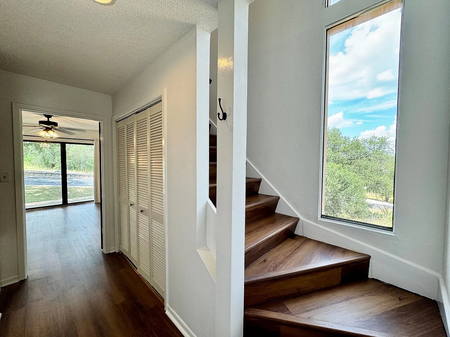 Move-In Ready Townhome with Thoughtful Multi-Level Design And NEW Flooring! — Photo 2