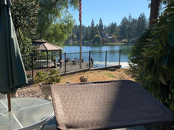 Gazebo and patio next to lake