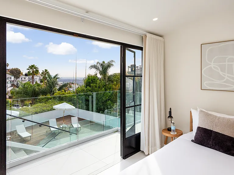 Find calm in a bedroom with unmatched views.