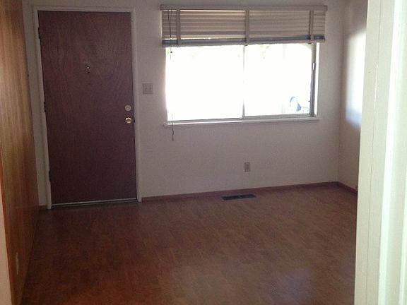 Living room with laminate hardwood flooring