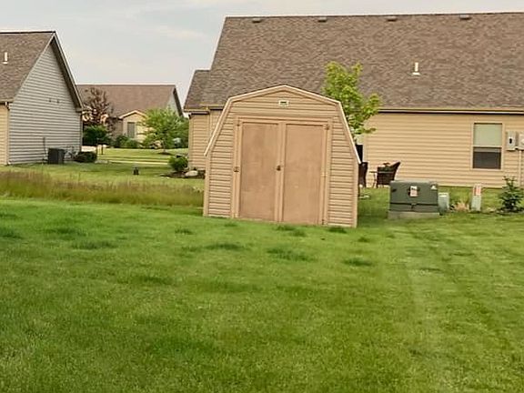 Storage shed stays with home