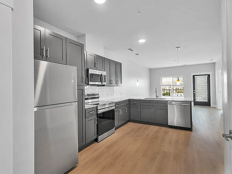 Modern Kitchen with Direct View of Living Area