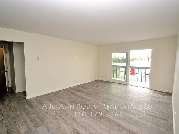Living room looking toward balcony