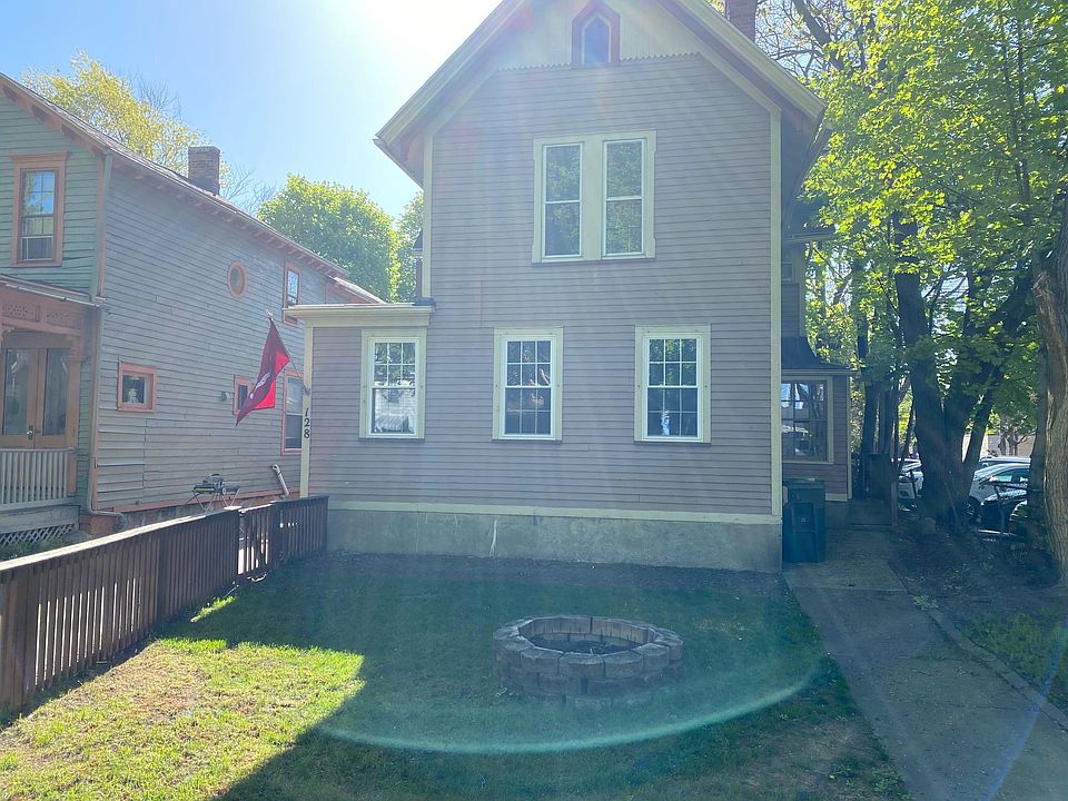128 Meigs Street view, fenced in front yard, bonfire pit.