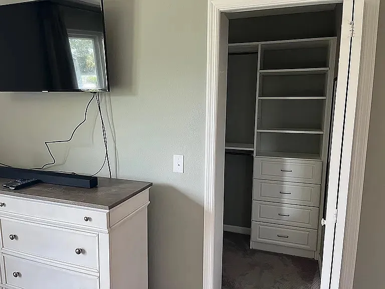 Master bedroom leading to closet