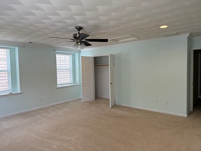 Fourth bedroom/finished room over garage.