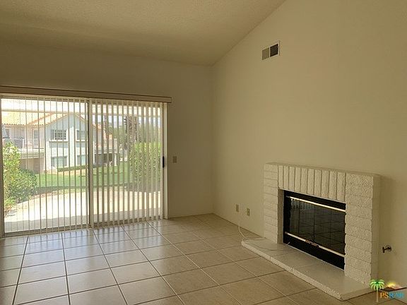 Fireplace and cathedral ceiling in Living Room