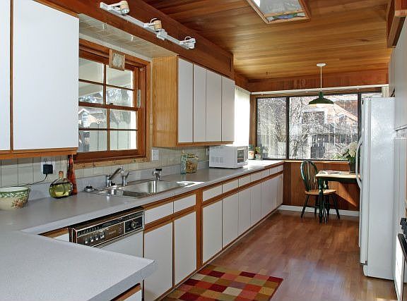 and the kitchen has breakfast nook