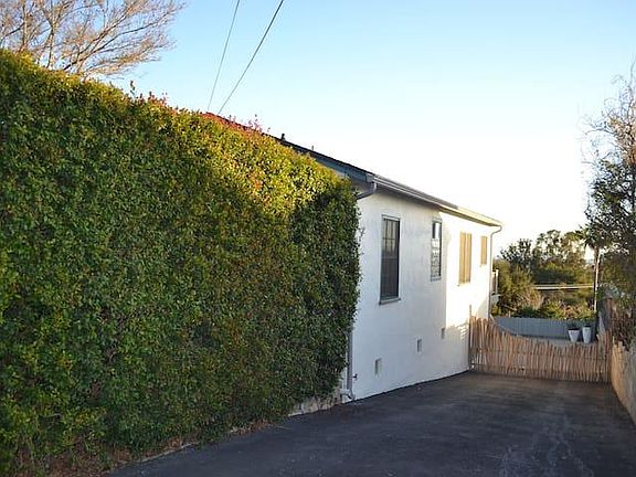 Drive way to back of property where apartment is located