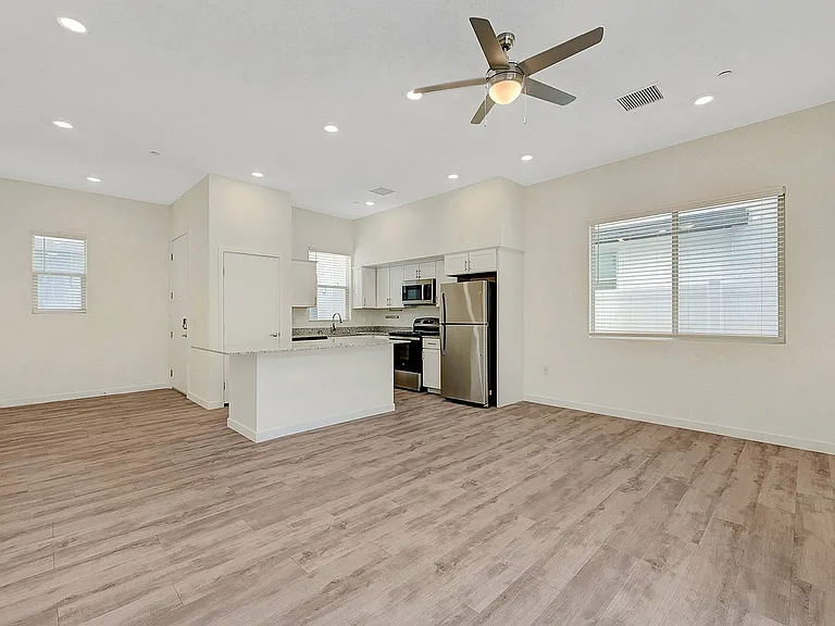 Experience modern living in this bright and airy open-plan space.