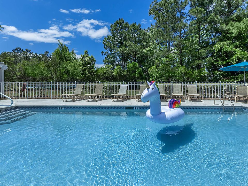 RELAX BESIDE OUR SPARKLING SWIMMING POOL