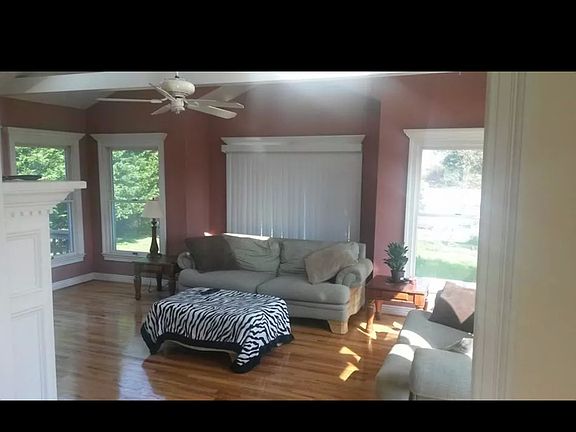 sunroom addition with skylights and fireplace