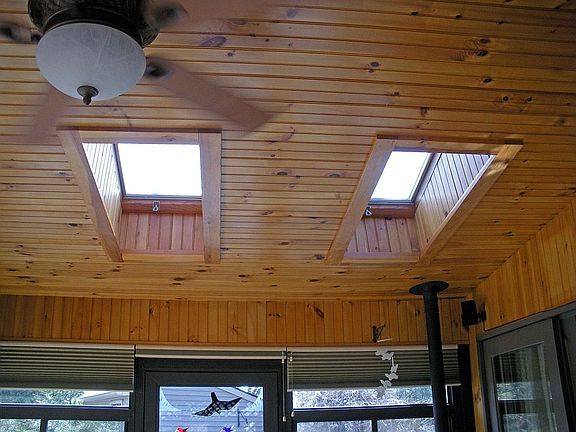 beautiful wood ceilings & skylights in 4 season rm, walk to amazing backyard