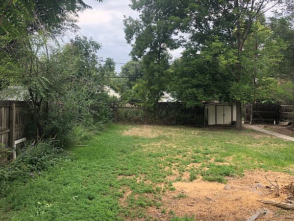 Huge fenced yard , shed