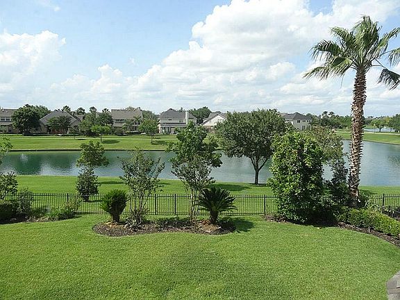  Gorgeous view from upstairs game room and bedroom. Large back yard. perfect for a pool.