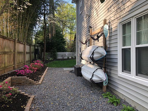 Left Side of House with Kayak/SUP Racks and Shower