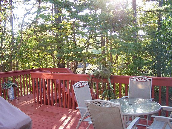 Large sun deck overlooking private backyard