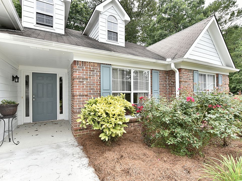 Brick and hardiplank siding