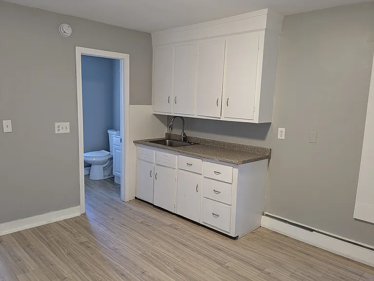 Clean kitchen with all new flooring