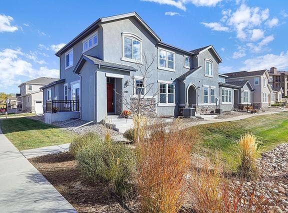 Front view, grass area out front door, guest parking on street